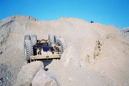 View of the truck looking up from the bottom of the embankment.