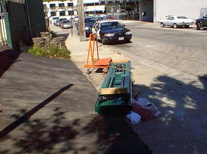 Exhibit #3  View of the incident scene looking south and depicting the pitch of the driveway ramp.