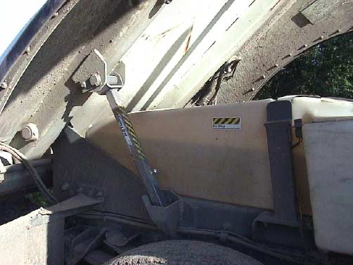 Figure 5. Hopper support safety bar in �In Use� position.