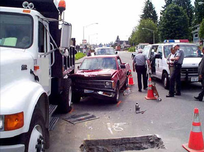 work zone incident site showing the second trench and the red pick-up truck