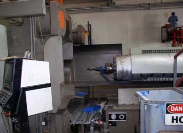 Exhibit #4. View of the injector with the protective shield open.