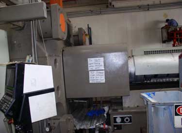 Exhibit #5. View of the injector mold with protective shield in place.