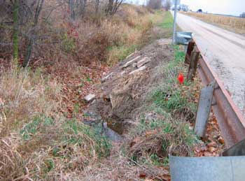 Figure 1. View of ditch from 2-track road. Looking to operator’s left.