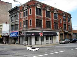 Photo 2. Incident Site Arrow indicates direction of turn