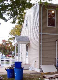 Photo 2. Porch roof peak used to support the scaffold plank.