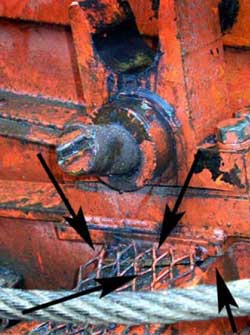 Tower hinge and box beam (arrows) broke, allowing tower to come down.