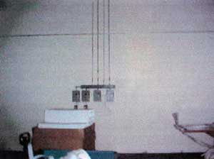 Photo 1. Conduit leading to switches at floor level
