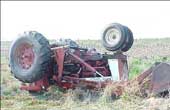 Tractor overturned in a field