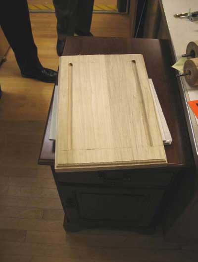 Wood piece being cut