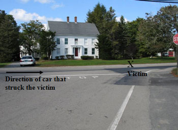 Property adjacent to the intersection where cars were parked perpendicular to the main roadway. The location of the car in the photograph is how close the cars were to the roadway and were parked all the way across the front lawn of the house.