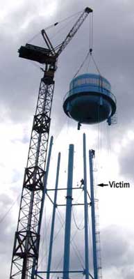 Photo 1 -- Picture of water tower taken a few minutes before the incident. (Photo credit--Marshalltown Times Republican)