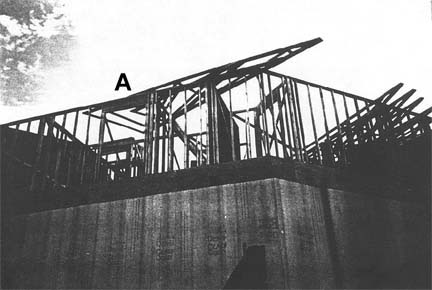 Three-story residential construction site.