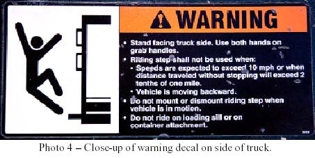 Photo 4 - Close-up of warning decal on side of truck.