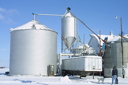 Photo 1 -- View of large grain bin and grain handling equipment at the farm