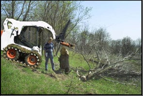 Electronic Image 1 - Approximate position of loader and raised tree shear attachment, looking from the side.