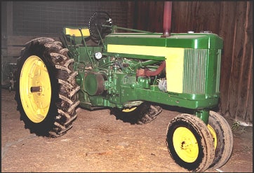side view of identical tractor model