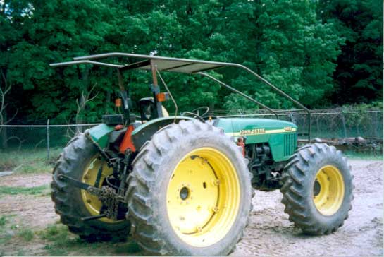 Figure 3 - The tractor involved in the incident with the top section of the ROPS disconnected and the wire guard installed.