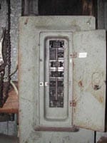 Figure 7. Unlabeled circuit breaker box in shed