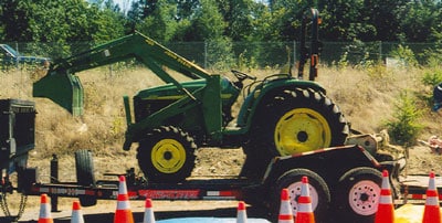 the tractor and mower attachment