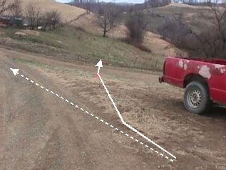 Figure 2. The dotted line represents the intended direction of the roll-start.  The solid white line represents the tractor's actual path.