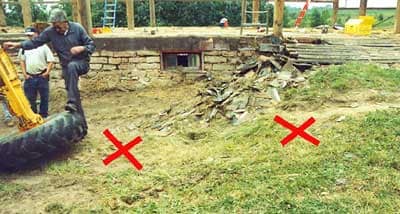 Photo 4 – View from the west of the barn, showing the approximate positions of the front wheels of the forklift, with the right wheel higher than the left due to the barn driveway.