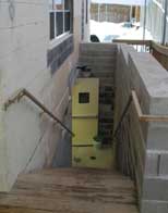 Photo 2. Completed stairway leading to the basement.