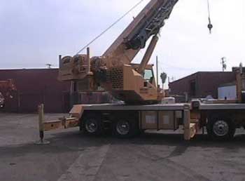 Exhibit #2. The truck-mounted crane rotating into position, depicting the blind spot for the operator.