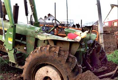 Close-up of the tractor, rear wheels dug in