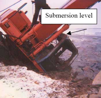 Figure 3. View of cab as excavator being lifted from mud.