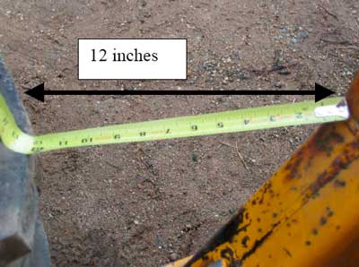 Figure 3. Width between subframe and rear tire of the tractor.