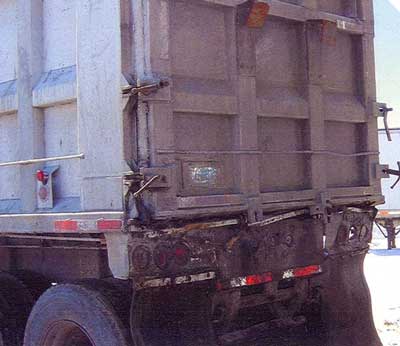 Figure 1. Rear gate of a semi trailer dump truck.