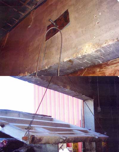 Figure 4. The semi trailer gate maintained in a raised position by the wire sling attached to the semi trailer locking pin and the attachment point above the door.