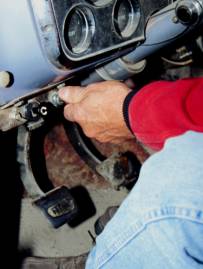 hand-operated knob inside the cab of the truck