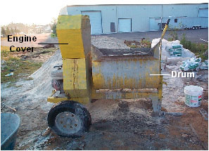Mixer with drum guard fully open.