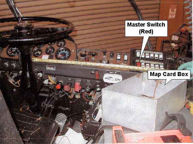 Photo 2. Cab of a rescue truck similar to one involved in incident showing locations of master switch and map card box.