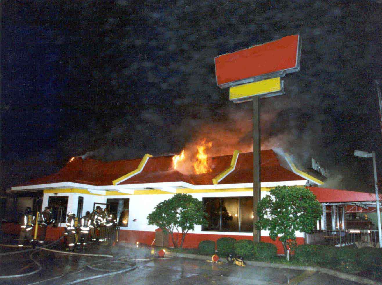 Photo 9: Exterior view of the restaurant fire at the approximate time the roof collapsed.