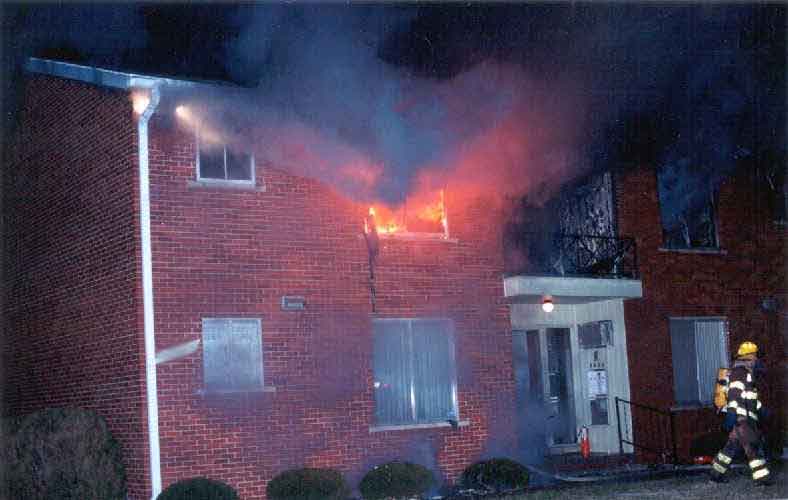 front page photo: Photograph of burning apartment building involved in this incident.