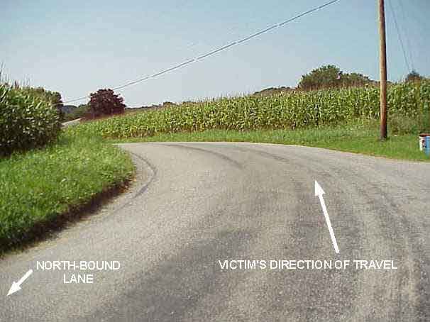 Photograph showing the curve in the road that the victim was traveling.