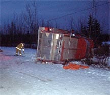 Photograph of the overturned fire engine.