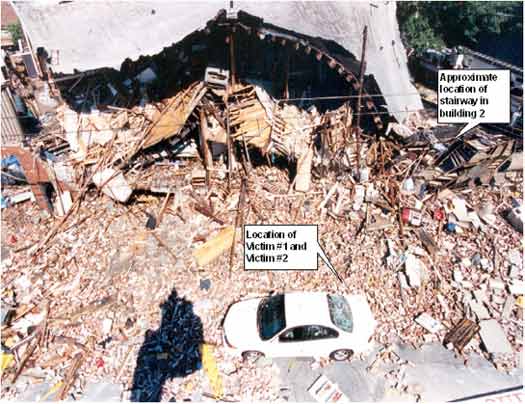 Photo 1. Collapse of Building from Side 2