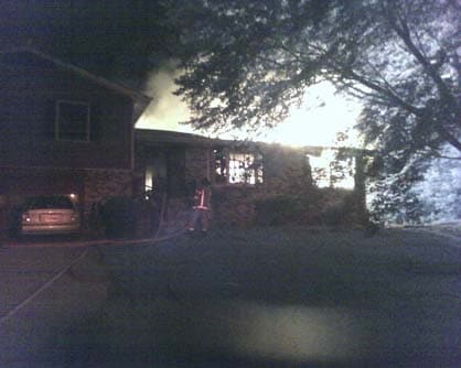 Photograph 2. Fire Incident: Tri-level house, single family dwelling, constructed of wood frame with brick and vinyl exterior