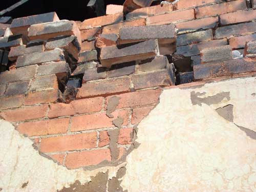 wall of broken brick