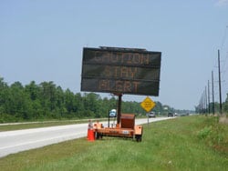 Electric portable blinking sign "CAUTION STAY ALERT"