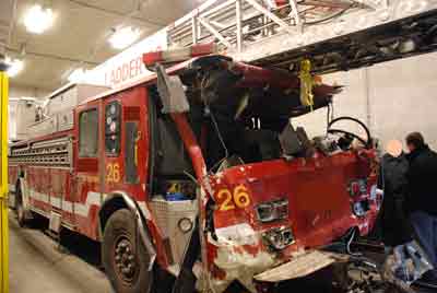 heavy damage to the cab of a fire truck