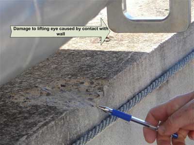 lifting eye and gouge in concrete wall