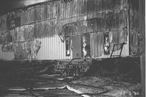 Front door of the burning structure where both victims entered to perform an interior fire attack