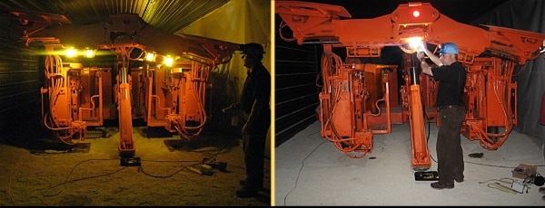 Laboratory photos of standard two-piece roof bolter lighting (left) replaced by the single NIOSH-developed area light (right). All illumination in these photos came from the machine-mounted lighting.