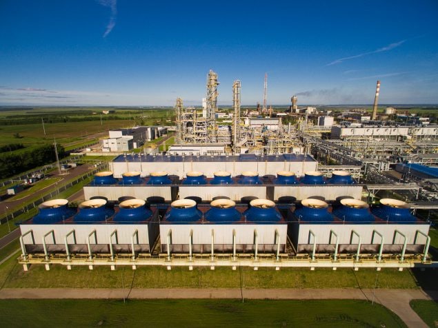 The cooling fans and units for nitric acid production on fertilizer plant. Aerial view Credit: valtron84