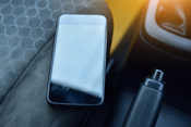 photo: phone sitting on front seat of a car