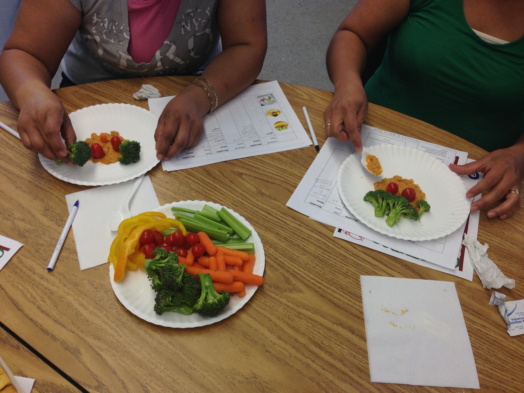 Photograph of a food-preparation activity from a culturally adapted nutrition education program for Mexican-origin families, California’s Central Valley, 2012–2013